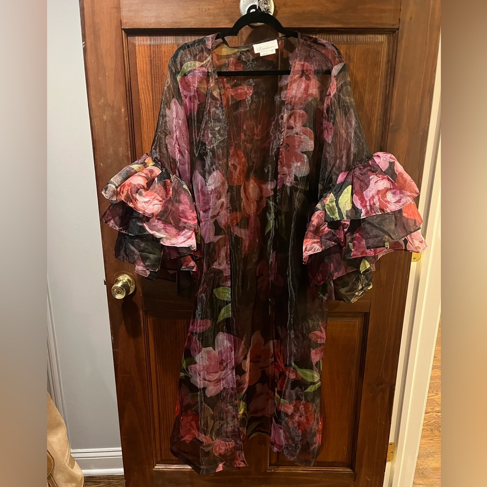 Floral, sheer, jacket
Perfect to dress up a blast dress or jumpsuit 
One size